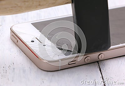 Close up of broken smart phone on white background and texture of Stock Photo