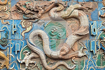 Close up of the brown dragon on the nine dragon wall Stock Photo