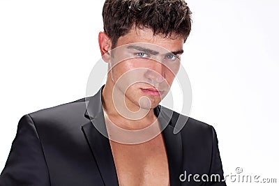 Close up of Brutal handsome man in black suit Stock Photo