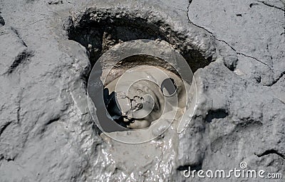 Close-up of bubbling mud in crater of mud volcano Stock Photo