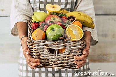 Close up of bucket full of fresh seasonal coloured fruits for healthy lifestyle and diet nutrition plan - local market shop Stock Photo