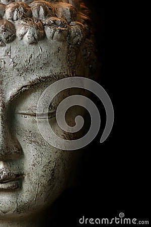 Close up Buddah statue with black copyspace Stock Photo