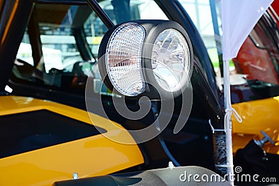 Close up on bulldozer headlight. Stock Photo