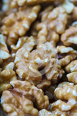 Close-up of a bunch of walnuts, with out of focus background. Vertical view Stock Photo