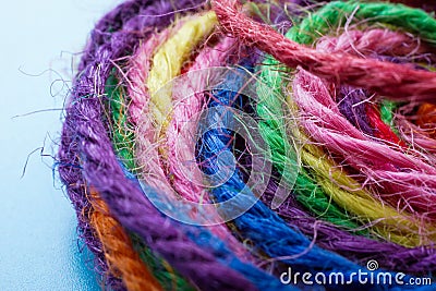 Close-up of a bundle of colorful threads. Symbolizing creativity, connection, and complexity. Stock Photo