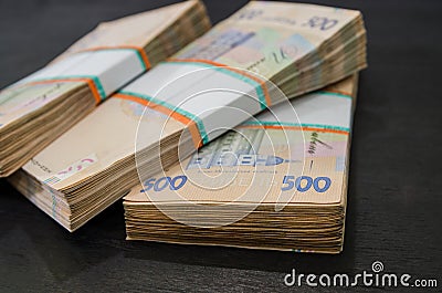 Close-up of a bundle of hryvnias. Financial concept. Ukrainian bills of 500 hryvnia. Many Ukrainian banknotes. Monetary concept. Stock Photo