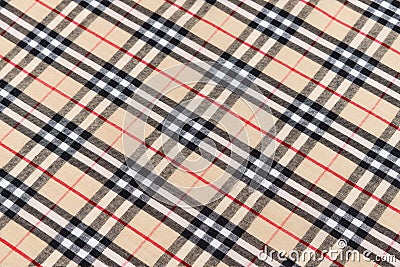 Close-up of Burberry fabric texture in beige, black and red. Image for your design October 26, 2023 in Kyiv, Ukraine Editorial Stock Photo