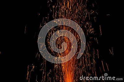 Close up burning flare or flame with bright sparks and smoke on background with copy space. festive event concept. fireworks Stock Photo
