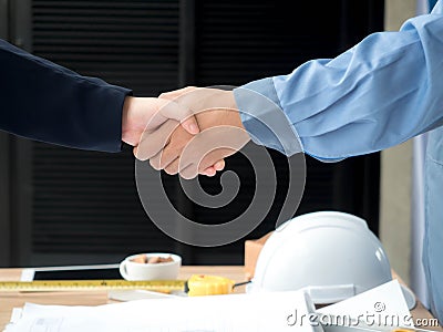 Close-up of business engineer planing at construction site project, documents, worker tool Stock Photo