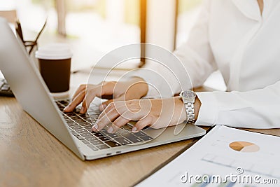 Close up business hands typing on laptop keyboard. Business hands surfing the internet Editorial Stock Photo