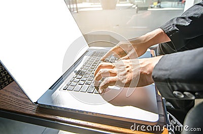 Close-up of business man hands on laptop keyboard. Stock Photo