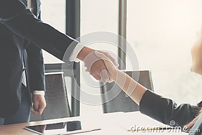 Close up of Business people shaking hands, finishing up meeting, business etiquette, congratulation, merger and acquisition Stock Photo