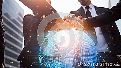 Close up of businessmen shaking hands. Global network and a world map in the foreground. block chain concept. Stock Photo