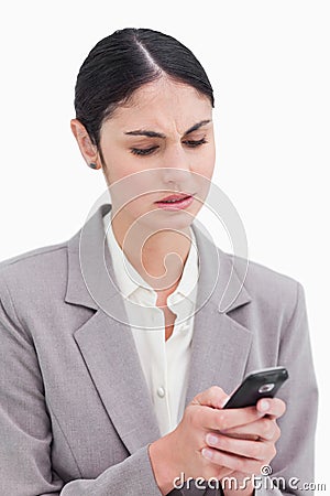 Close up of businesswoman confused by text message Stock Photo