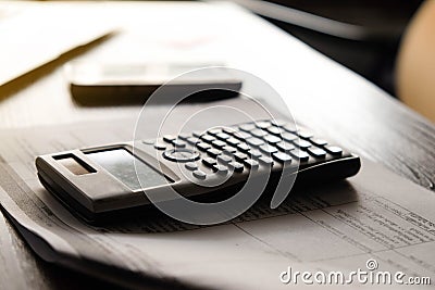 Close up calculator counting making notes at home,account and financial concept. Stock Photo