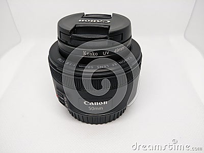 Close-up of camera lens on white background. Editorial Stock Photo