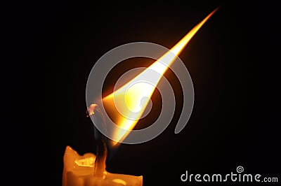 Close Up Candle With Creative Flame Stock Photo