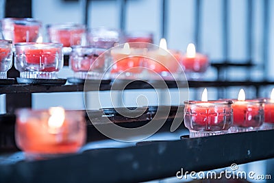 Historic catholic church: Close up picture of candles Stock Photo