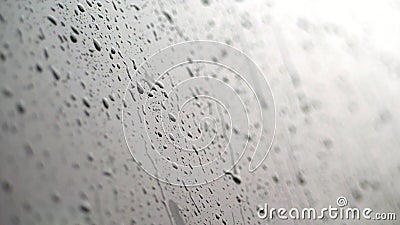 close-up, on the car glass windows rain drops drip down a multitude of streams. it's raining heavily, downpour Stock Photo