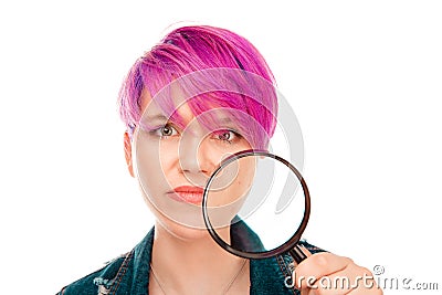 Girl looking at camera showing her acne with magnifier Stock Photo