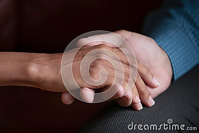 Close up view man holds hand of beloved woman Stock Photo