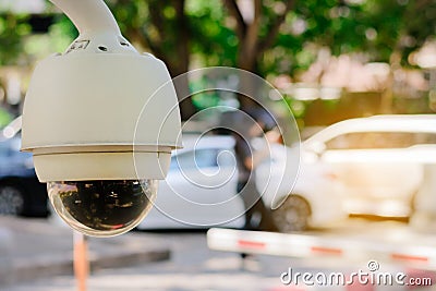 Close-up CCTV monitoring, security cameras at outdoor car parking. Stock Photo