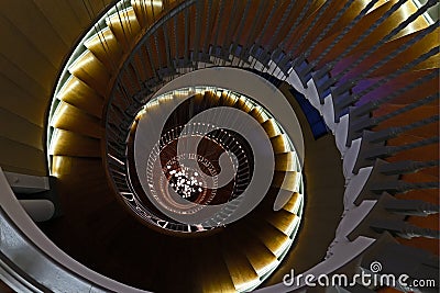 Close up of Cecil Brewer Spiral Staircase with Bocci lights at Heal`s Furniture Store, Tottenham Court Road, London Editorial Stock Photo