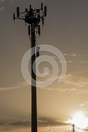 Close Up of Cellphone Tower at Sunset Stock Photo