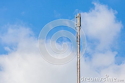 Close up Cellular transmitter, dipole antenna for telecommunications with clear blue sky background. Stock Photo