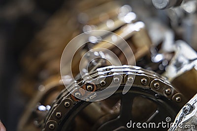 Close up chain camshaft timing of engine on blur camshaft backgrpound Stock Photo