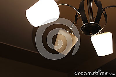 Close up of Chandelier with one fused bulb Stock Photo