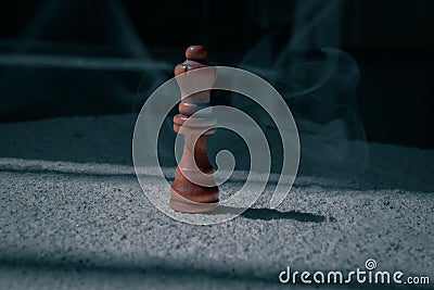 Close-up of a chess figure - the concept of overcoming the challenges alone Stock Photo