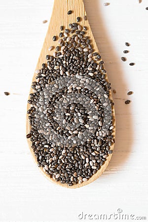 Close up Chia seeds in wooden spoon Stock Photo