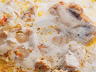 Chicken slices cooked in a creamy sauce Stock Photo