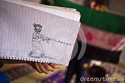 Close up of childs sketch of a soldier in Atmeh,Syria. Editorial Stock Photo