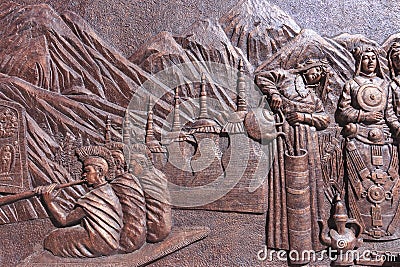 Close up of Chinese carving depicting the daily life of the Chinese minorities in Lijiang Old Town Editorial Stock Photo