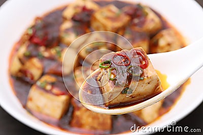 Chinese cuisine mapo doufu with spoon Stock Photo