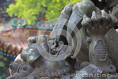 Close up of Chinese statute of baby dragon / lion in China Stock Photo