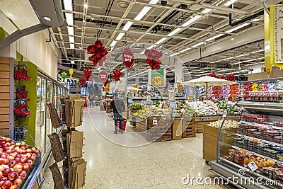 Close up Christmas decorated interior view of famous Swedish ICA supermarket. Trading chain. Editorial Stock Photo