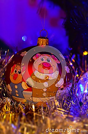 Close-up of Christmas decorations and toys with the image of a pig with a soft blurred background. Stock Photo