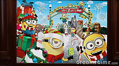 Close up of Christmas Happy holiday version of HAPPY MINION statue Editorial Stock Photo