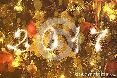 Close up on Christmas tree and sparkling 2017 sign Stock Photo