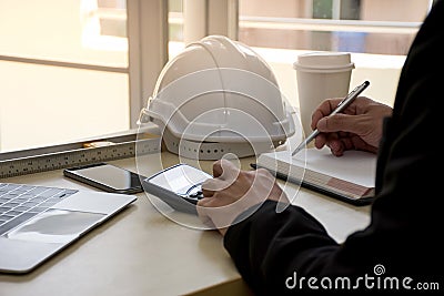 Close up of civil design engineer is making structural analysis calculations using a scientific calculator Stock Photo