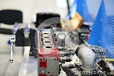 Close-up clamp mounted grip with screw action grip and cast iron frame, in a machining workshop Stock Photo