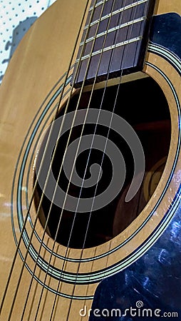 Close up of Classic Acoustic Guitar and Strings Stock Photo
