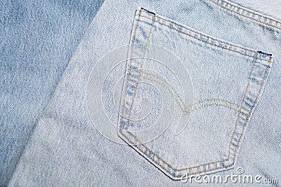 Close up classic blue jeans denim back pocket texture close up top view Stock Photo