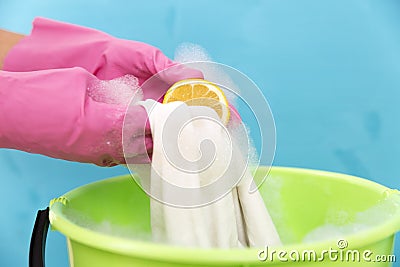 Close-up of cleaner woman hand removing stain Stock Photo