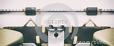 CLIENTS word in capital letters on a typewriter sheet Stock Photo