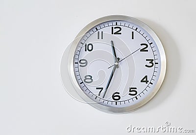 Clock on a white background Stock Photo