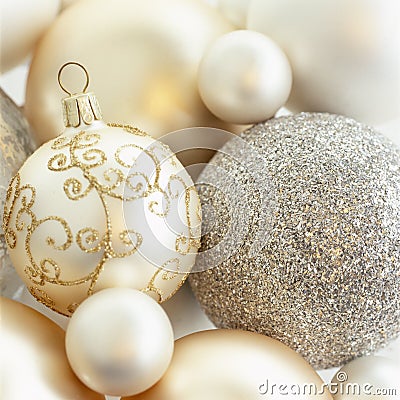 Close-up closeup of beautiful, fancy, elegant, silver, white and gold Christmas baubles ornaments. Luxury holiday decorations Stock Photo